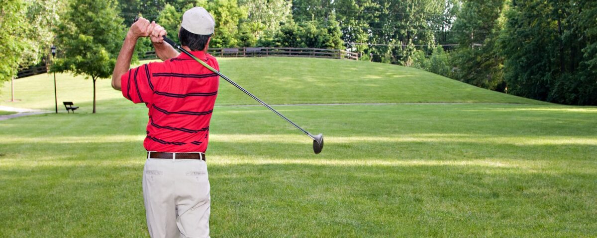 guy playing golf