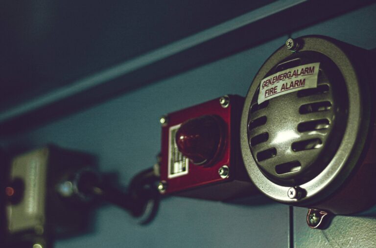 A general emergency alarm or fire alarm system attached on a wall.